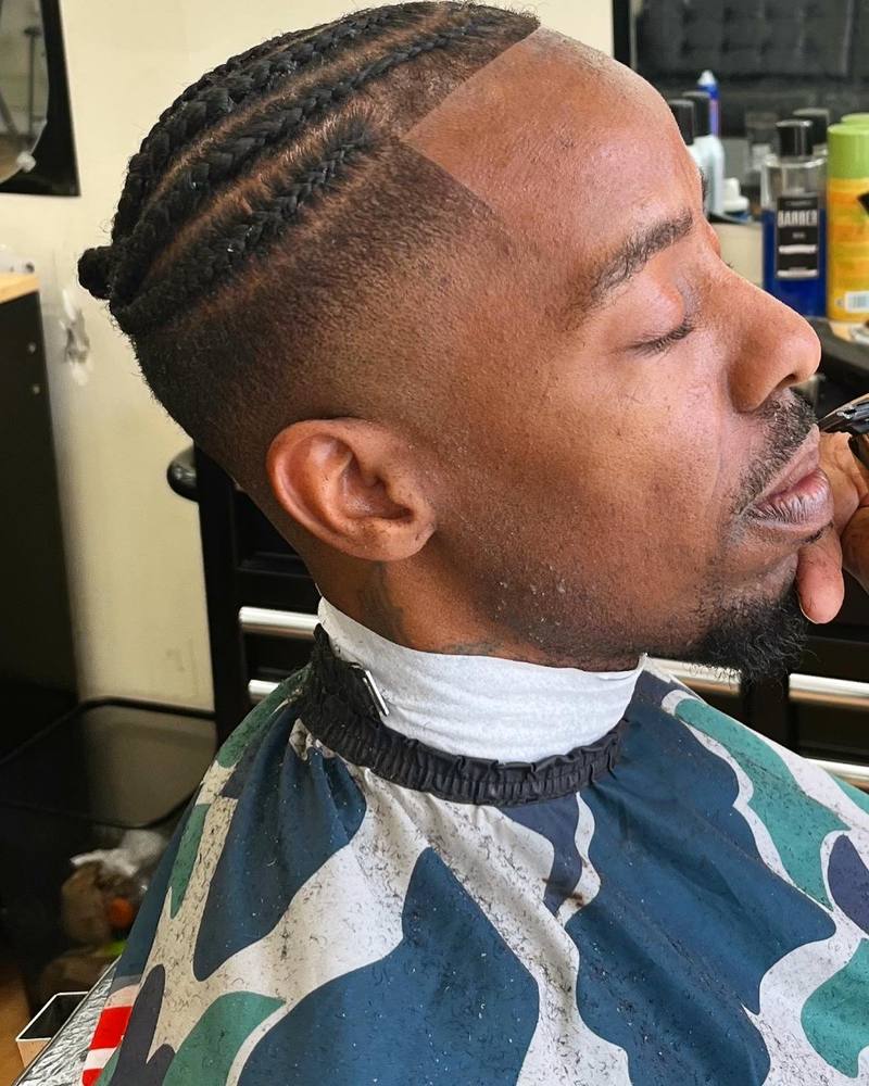 A precision fade and lineup in progress at Greene's Barber Service